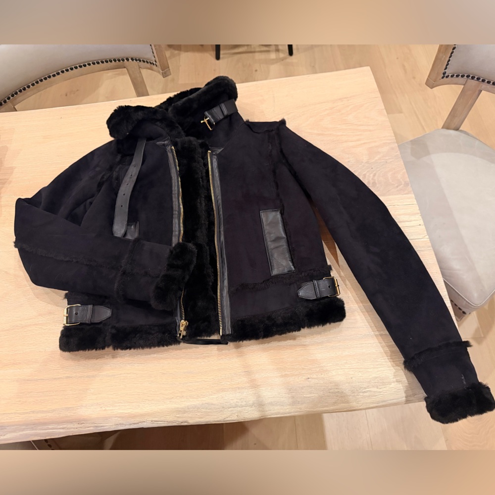 Juicy Couture Black Faux Leather Jacket with Fur lining.